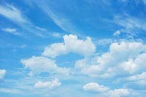 Blue sky background with clouds. white fluffy clouds