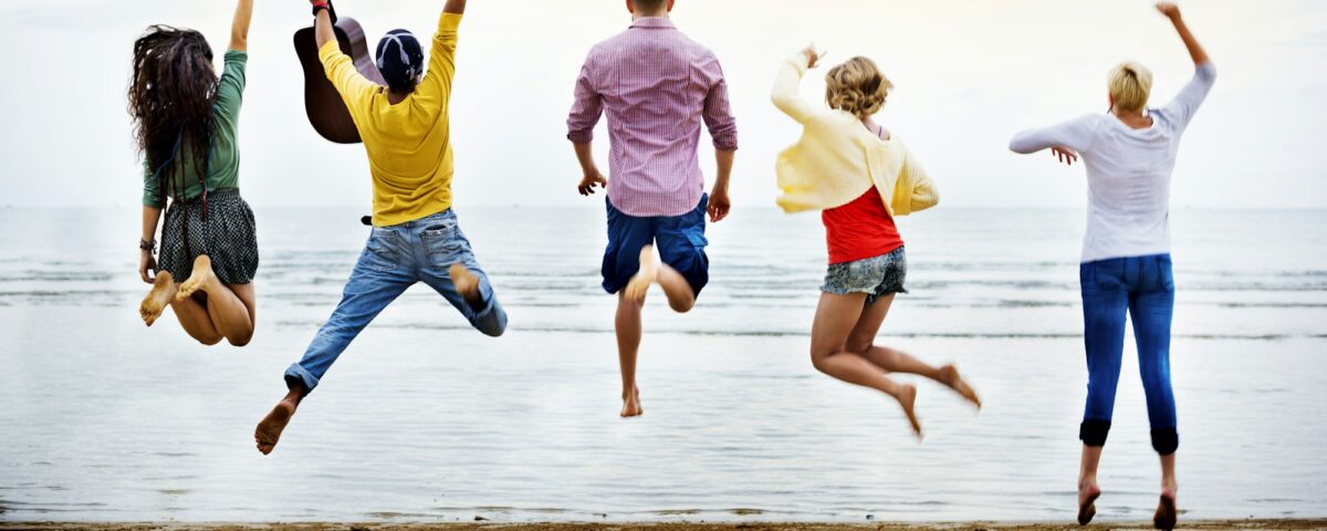 Friends jumping with joy