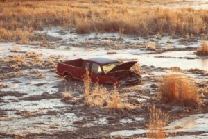 Pick up truck stuck in swamp