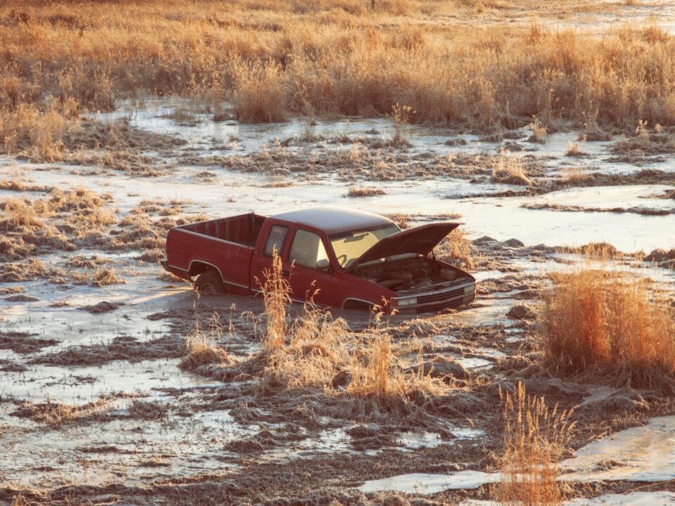 Pick up truck stuck in swamp